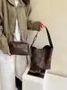 Bolso cubeta retro con estampado de leopardo para mujer, nuevo estilo 2026, bolso de hombro de gran capacidad, bolso cruzado y bolso tote con un organizador a juego