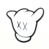 Kaws dibujó44 zapatos de agujero de traje de moda zapatos flor sabiduría estrella pegamento suave DIY estudiante croc accesorios al por mayor