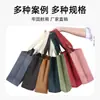 Loja de Roupas Bolsa de Mão Sacola Não Tecida Personalizada Loja de Roupas Femininas Sacola de Compras para Roupas Embalagem Sub-Rede Bolsa de Mão de Celebridade