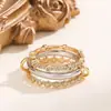 Anillo de Luz de Zirconia Incrustada en Oro Real Chapado en Cobre Transfronterizo Europeo y Americano Lujo Ligero Sensación de Alta Gama Anillo para el Dedo Joyería de Mano Versátil Fabricante Venta al por Mayor en Stock