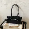 Bolso de hombro nuevo y elegante de ante 2026 con gran capacidad bajo el brazo y colgante exquisito, uso diario sencillo para mujeres en otoño