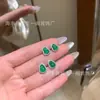 Venta al por mayor de fábrica pequeños rojos departamento material natural peligroso yang verde jade calabaza aretes s925 plata incrustados nuevo temperamento chino mujeres