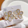 Brincos Coloridos Ins Retro Flor de Metal Simples Flor de Ameixa Atacado Pétalas Aço Inoxidável Novos Brincos para Mulheres