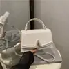 Bolsa de Mão Quadrada Pequena Texturizada da Moda 2025 Nova Casual para Mulheres Bolsa de Ombro Axila Bolsa Transversal de Cor Pura Francesa