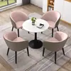 Mesa redonda de pizarra estilo nórdico para oficinas de ventas, tiendas de té de burbujas y balcones; un conjunto de mesas redondas y sillas de pizarra de lujo ligero