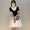 Falda Midi Blanca Calada Estilo Francés para Mujer, Primavera 2026, Cintura Alta, Corte Holgado, Versátil, Adelgazante, Adecuada para Figuras Pequeñas, Falda de Corte A
