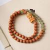 Niña DIY pulsera de sándalo rosario fabricantes especificaciones al por mayor 0.6 decoraciones de juego literario para hombres y mujeres