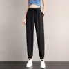 Calça Casual Fina de Seda Gelada de Verão com Cordão e Bolso Nova Chegada Feminina Calça de Pernas Finas Versátil Calça Esportiva Casual Feminina Calça Transfronteiriça