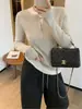 Moda europeia primavera 2026 novo estiloso e elegante falso duas peças justo malha feminina solto casual top