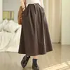 Otoño/Invierno 2026 Nueva Falda Larga de Lana para Mujer Estilo Literario Retro Talla Grande Color Sólido Longitud Media Versátil Falda de Línea A para Mujer