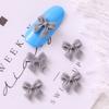 Arte de Uñas Mariposa Grabada Lazo Decoración de Uñas de Resina 3D Hueco Decorativo Pedrería Estilo Ins Estilo de Lujo Ligero