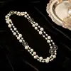 Colección Larga de Collares Superpuestos de Perlas Swarovski para Mujer, Estilo Lujo Ligero, Cadena Versátil para Suéter con un Toque de Alta Gama, Venta al por Mayor Otoño e Invierno