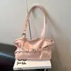 Nova bolsa de ombro feminina estilo coreano Shuai Mi Jia, bolsa de axila de nicho da moda com grande capacidade, bolsa tote texturizada para o dia a dia