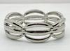 Pulsera de aleación de moda transfronteriza europea y americana galvanoplastia hueca diseño original para mujer apertura pulsera ancha venta al por mayor directa de fábrica