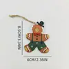 Boneco de Homem de Pão de Gengibre de Resina Natalino Novo Retrô Americano Pingente Acessórios Bolsa Decoração de Árvore de Natal de Mesa Venda por Atacado