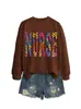 Amazon eBay sitio independiente casual de moda personalizado para mujer enfermera colorido estampado de leopardo otoño e invierno sudadera de cuello redondo