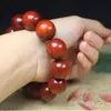 Pulsera de cuentas de sándalo rojo pera de cártamo pequeña mercancía más vendida fabricantes de pulseras de cuentas venta al por mayor