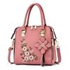 Bolso de mujer de fábrica al por mayor moda bordado bolso de mano para mediana edad 2023 ambiente simple bolso de hombro bandolera bolso de madre