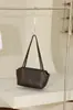 Bolso Minimalista de Piel de Oveja para Axila 2026 Nuevo Bolso Tote de Piel Genuina Bolso de Nicho para Viajero Bolso Baguette Bolso de Mano Bolso de Hombro