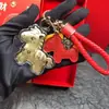 Llavero de Oro Puro 999 Colgante de Oro Año del Caballo Oro de Nicho Lámina de Oro Bolsa de la Suerte Colgante para Coche Adorno de Regalo de Alta Gama