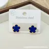 Joias Novas Transfronteiriças Pulseira de Trevo de Cinco Folhas em Aço Titânio Dupla Face para Mulheres Não Desbota Ouro 18K Joias de Luxo Leve Atacado