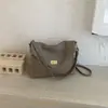 Primavera de 2026 Nova Moda Coreana Estilo Preguiçoso Fivela de Trava Bolsa de Ombro Único Sob o Braço Couro Macio Retrô Bolsa para o Dia a Dia Bolsa Transversal para Mulheres