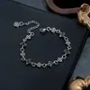Pulsera para hombre de estilo europeo y americano con cruz incrustada de diamantes, acero de titanio, no se decolora, joyería versátil de alta gama, accesorio de nicho moderno para mujer