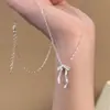Colar de laço de luxo leve estilo francês feminino nicho fosco colar de laço tridimensional fita fada clavícula corrente