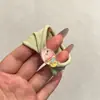 Coloridos coleteros de nuevo estilo 2026, versátiles y dulces, con accesorios de M&M's, anillos de toalla, diseños de dibujos animados y un estilo fresco y lindo, perfectos para accesorios para el cabello de niños