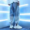 Pantalones Jogger Sueltos de Dibujos Animados de Marca de Moda Ins Verano Nuevo Estampado de Letras Jeans con Cordón para Hombre Estilo Hombre