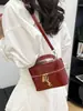 Bolso de Mano de Caja Brillante con Textura de Gama Alta para Mujer, 26 Modelos Nuevos, Moda Transfronteriza Trendy Nicho Diario Bolso de Hombro y Cruzado