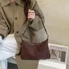 2026 Nueva Bolsa Coreana de Nicho Minimalista Textura Suave Forma de Empanadilla para Debajo del Brazo Bolsa de Hombro Única para Viajar Bolsa Cruzada
