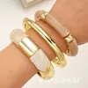 Accesorio transfronterizo de gran venta, producto nuevo: brazalete abierto de forma de ola irregular para mujer, conjunto de tres piezas personalizado y de moda de joyería para mujer
