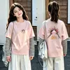 Camiseta de manga comprida com desenho para meninas, conjunto de duas peças de outono, novo estilo 2026, para crianças de tamanho médio e grande, camada base de algodão puro