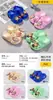 Nuevos Zapatos de Cueva para Niños y Niñas Verano Interior Exterior Macarrón Lindos Dibujos Animados Sandalias Infantiles Venta al por Mayor