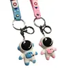 Llavero de producción de fábrica Pin de muñeca Llavero de ropa creativa Colgante de astronauta espacial PVC suave profesional
