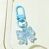 Novo Chaveiro Criativo Colorido de Gelo Transparente Flor de Cerejeira Ornamento Artesanal DIY Coração de Menina Ornamento Pingente para Bolsa de Homens e Mulheres
