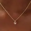 Nuevo Producto Transfronterizo de Comercio Exterior: Collar con Inicial de Oro y Cadena para Clavícula Tachonada de Diamantes, Accesorio de Fiesta Navideña Moderno y Personalizado