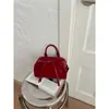 Bolso Boston tipo almohada de alta gama para mujer 2026 Nuevo modelo Bolso de mano con diseño de nicho para el uso diario Bolso cruzado