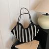 Bolsa de grande capacidade da moda feminina primavera 2025 nova bolsa de ombro feminina casual simples e têxtil