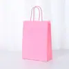 Punto 26 Color sólido Bolsa de mano de papel Kraft para llevar a mano Bolsa de regalo Bolsa de papel de envolver estilo Ins venta al por mayor