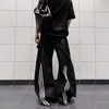 Jeans masculino de modelagem larga e despojada, estilo americano resistente e descolado, com patchwork de três listras e design curvo.