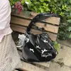 Bolsa de ombro doce e fofa em formato de laço amarelo leitoso, com design de alça de ombro franzida, uma bolsa transversal fofa para meninas
