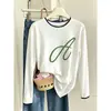 Camiseta de manga larga con cuello redondo, estilo commuter moderno, tipo dos piezas, para mujer, de algodón puro, en blanco, estilo coreano, simple, casual y versátil.