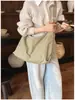 Nova coleção Primavera/Verão 2026: Bolsa transversal de grande capacidade para mulheres, com design de luxo leve, moderno, minimalista e retrô, adequada para o dia a dia.