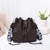 Bolso tipo cubo elegante para mujer, gran capacidad, 2023, nuevo, moderno, personalizado, con cordón, bolso para el día a día, bolso de hombro cruzado moderno y a la moda