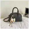 Bolso de Mano Minimalista Boston 2026 Modelo Nuevo Bolso de Bowling de Gama Alta Versátil de Nicho Bolso Cuadrado Pequeño Bolso Cruzado