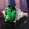 Anillo de lujo con circonita verde chapada en platino para damas, con explosiones europeas y americanas de Cao Shi, para fiesta, joyería de mano al por mayor