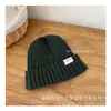 Nueva gorra simple de lana para niños y niñas gorro de punto cálido para bebé moda infantil todo-partido al por mayor