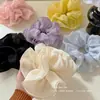 Goma de pelo extra grande morada suave para mujer, adecuada para coletas bajas, con un diseño suave y elegante